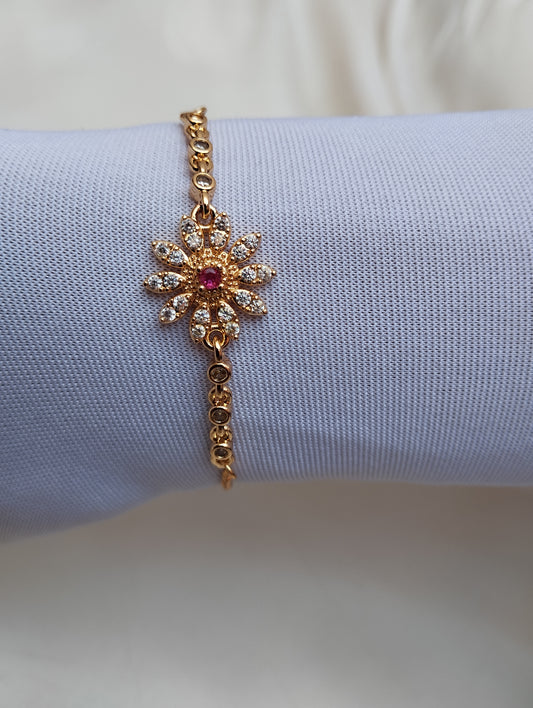 Golden Daisy Bracelet with Pink Stone Center