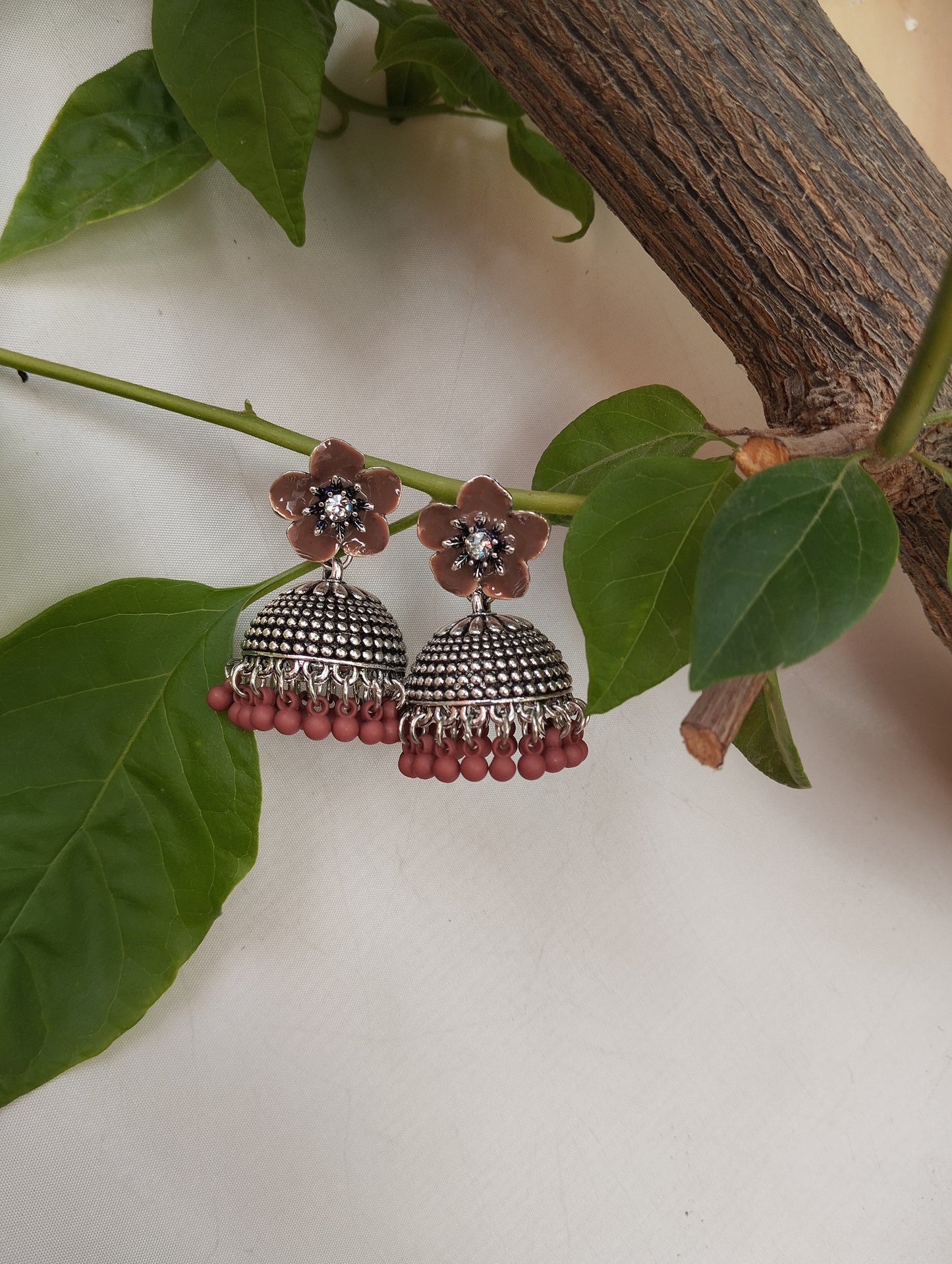 Earthy & Boho Matte Brown Floral Oxidized Jhumka Earrings